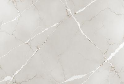 The primary subject of the image is a marble tile wall. The setting is a room with a white marble tile wall, which is the main object of the image. The visual style is a photo, and the colors and mood are predominantly white, giving the room a clean and elegant appearance.