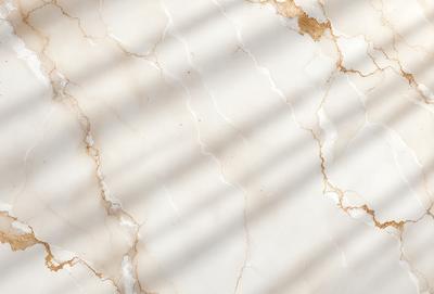 The primary subject of the image is a marble countertop with a white background. The visual style is a photo, and the colors and mood are predominantly white and neutral.