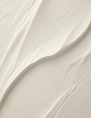 The primary subject of the image is a white marble wall with a pattern of swirls and waves. The setting is a room with a white marble wall as the main focus. The visual style is a close-up of the marble wall, showcasing its intricate design. The colors and mood of the image are predominantly white, giving it a clean and elegant appearance.
