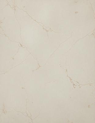 The primary subject of the image is a white marble wall with a pattern of holes and cracks. The setting is a room with a white marble floor. The visual style is a close-up of the marble wall, showcasing its unique texture and pattern. The colors and mood of the image are predominantly white, giving it a clean and elegant appearance.