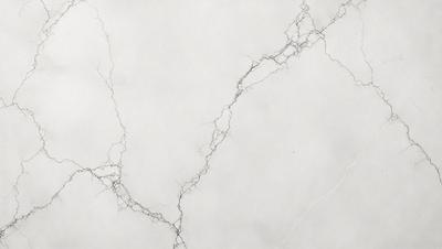 The primary subject of the image is a white wall with a cracked and textured surface. The setting is a room with a white background. The visual style is a close-up of the wall, showcasing its unique texture. The colors and mood of the image are predominantly white, giving it a clean and minimalist appearance.