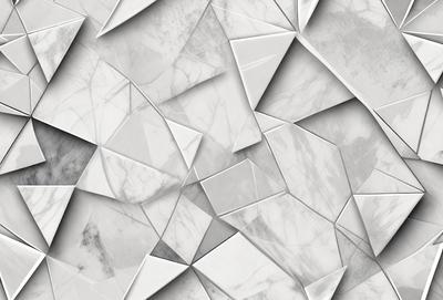 The primary subject of the image is a marble wall with a pattern of triangles. The setting is a room with a white marble wall, and the visual style is a close-up of the wall. The colors and mood of the image are predominantly white, giving it a clean and elegant appearance.