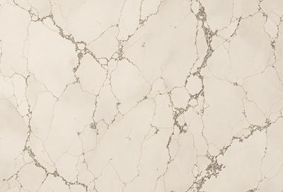 The image features a white marble wall with a rough texture. The wall appears to be made of marble, giving it a unique and elegant appearance. The marble wall is the primary subject of the image, and it is set against a white background, which further emphasizes the wall's texture and beauty. The visual style of the image is a close-up of the marble wall, allowing the viewer to appreciate the intricate details of the stone. The colors and mood of the image are predominantly white, giving