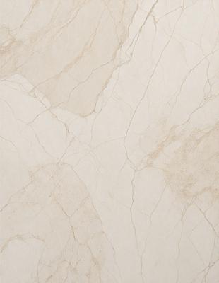 The image features a white marble wall with a pattern of brown streaks. The wall appears to be made of marble tiles, giving it a luxurious and elegant appearance. The brown streaks add a touch of natural texture to the otherwise pristine white surface.