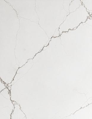 The primary subject of the image is a white marble wall with a cracked texture. The setting is a room with a white background. The visual style is a photo of the marble wall. The dominant colors are white and gray, creating a clean and minimalist atmosphere.