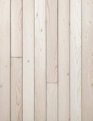 The primary subject of the image is a wooden floor with a patterned design. The setting is a room with a wooden floor, and the visual style is a photo. The colors and mood of the image are predominantly white, giving it a clean and minimalist appearance.