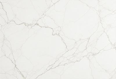 The primary subject of the image is a white marble wall with a pattern of holes. The setting is a room with a white marble floor. The visual style is a close-up of the marble wall, showcasing its unique texture and design. The colors and mood of the image are predominantly white, giving it a clean and elegant appearance.