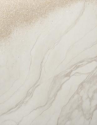 The primary subject of the image is a marble countertop with a patterned design. The setting is a kitchen or bathroom environment, with a sandy or beach-like background. The visual style is a close-up of the marble countertop, showcasing its intricate pattern. The colors and mood of the image are predominantly neutral, with a touch of warmth from the sandy background.