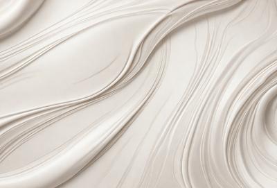 The primary subject of the image is a white, flowing, and curling piece of fabric. The setting is a white background, which creates a clean and minimalist appearance. The visual style is a close-up of the fabric, showcasing its texture and details. The colors and mood of the image are predominantly white, giving it a calm and serene atmosphere.