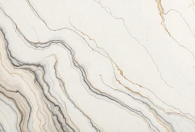 The primary subject of the image is a marble countertop with a white and gold color scheme. The setting is a kitchen, and the visual style is a close-up of the marble countertop. The colors and mood of the image are elegant and sophisticated, with the white marble providing a clean and timeless appearance, while the gold accents add a touch of luxury and warmth.