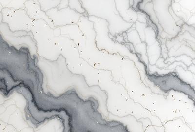 The primary subject of the image is a marble surface with a pattern of gold specks. The setting is a white marble countertop, and the visual style is a close-up of the marble surface. The colors and mood of the image are predominantly white and gold, creating a sense of elegance and sophistication.