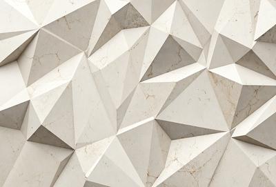 The primary subject of the image is a white marble wall with a unique geometric pattern. The setting is a room with a white marble wall, and the visual style is a close-up of the wall. The colors and mood of the image are predominantly white, giving it a clean and minimalist appearance.
