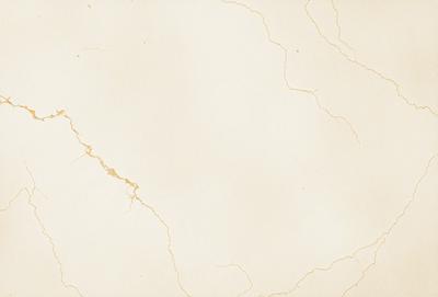 The primary subject of the image is a white wall with a cracked texture. The setting is a room with a white background. The visual style is a photo, and the colors and mood are predominantly white, giving the image a clean and minimalist appearance.