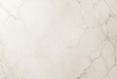 The image features a white marble wall with a pattern of holes and bumps. The wall appears to be a part of a building, possibly a bathroom or a kitchen. The marble surface gives the wall a unique and elegant appearance.