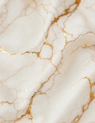 The primary subject of the image is a marble-like surface with gold accents. The setting is a white background, and the visual style appears to be a combination of photo and digital art. The colors and mood of the image are predominantly white and gold, creating a luxurious and elegant atmosphere.