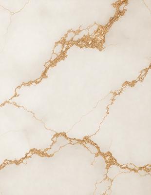 The primary subject of the image is a marble wall with a gold-colored pattern. The setting is a room with a white background. The visual style is a close-up of the marble wall, showcasing the gold pattern. The colors and mood of the image are predominantly white and gold, creating a luxurious and elegant atmosphere.