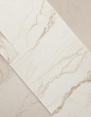 The primary subject of the image is a marble tile, which is the main object, scene, or focus of the image. The setting is a countertop, and the visual style is a photo. The colors and mood of the image are predominantly white, giving it a clean and elegant appearance.
