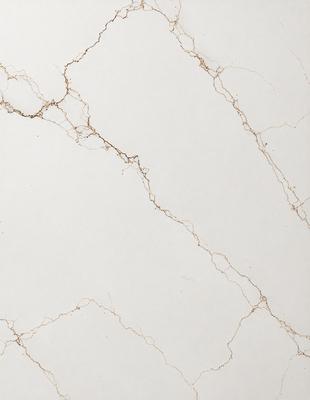 The image features a white marble wall with a pattern of brown streaks. The wall appears to be a part of a bathroom, as it is described as a "bathroom wall." The brown streaks on the white marble create a unique and visually appealing design.