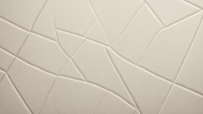 The primary subject of the image is a white wall with a pattern of triangles. The setting is a room with a white surface, and the visual style appears to be a combination of a photo and digital art. The dominant colors are white and gray, creating a clean and minimalist atmosphere.