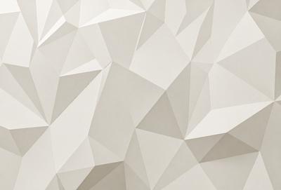 The image features a white wall with a geometric pattern, possibly a triangular or diamond shape. The wall appears to be made of a material that gives it a textured appearance. The pattern is the primary subject of the image, and it creates a visually interesting and unique design.