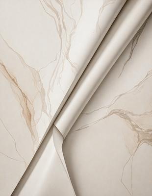 The primary subject of the image is a marble countertop with a brown and white pattern. The countertop is displayed in a room with a white wall. The visual style of the image is a photo, showcasing the natural beauty of the marble countertop. The colors and mood of the image are predominantly white and brown, giving it a warm and elegant appearance.