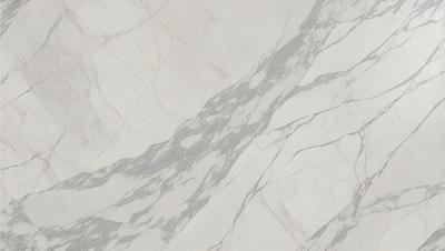 The primary subject of the image is a marble-like pattern on a wall. The setting is a white wall with a pattern that resembles marble. The visual style is a close-up of the marble-like pattern, which gives the image a realistic and textured appearance. The colors and mood of the image are predominantly white, creating a clean and elegant atmosphere.