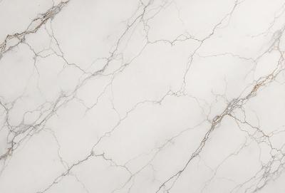 The primary subject of the image is a marble wall with a white and grey color scheme. The setting is a room with a white marble floor. The visual style is a close-up of the marble wall, showcasing its texture and pattern. The colors and mood of the image are predominantly white and grey, giving it a clean and elegant appearance.