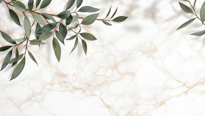The primary subject of the image is a green leafy branch with a few leaves attached to it. The branch is placed on a white marble surface, which serves as the setting and background of the image. The visual style of the image is a photo, capturing the natural beauty of the leafy branch. The colors in the image are predominantly green, with the white marble surface providing a clean and elegant backdrop. The overall atmosphere of the image is serene and peaceful, as the leafy branch stands out against the