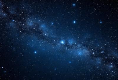 The primary subject of the image is the night sky filled with stars. The setting is a dark, star-filled sky, and the visual style is a photo. The colors and mood of the image are predominantly dark and serene, with the stars providing a sense of wonder and tranquility.