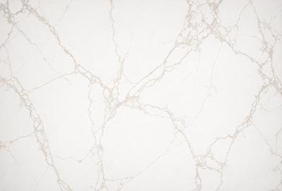 The image features a white marble wall with a pattern of veins and a texture that resembles a spider web. The wall appears to be a part of a building, possibly a bathroom or a kitchen. The overall atmosphere of the image is clean and elegant, with the white marble wall serving as a striking focal point.