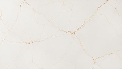 The primary subject of the image is a white marble wall with a gold-colored, textured surface. The setting is a room with a white background, and the visual style is a close-up of the marble wall. The colors and mood of the image are predominantly white and gold, creating a luxurious and elegant atmosphere.