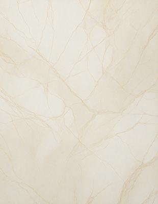 The primary subject of the image is a marble wall with a cream-colored texture. The setting is a room with a white background. The visual style is a close-up of the marble wall, showcasing its unique texture. The colors and mood of the image are warm and inviting, with the marble wall serving as a focal point in the room.