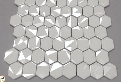 The primary subject of the image is a white tile wall with a hexagonal pattern. The setting is a room with a white tile floor. The visual style is a close-up of the tile wall, showcasing the intricate pattern. The colors and mood of the image are predominantly white, giving it a clean and minimalist appearance.