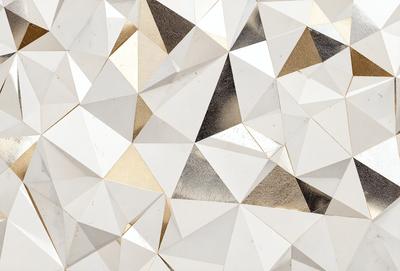 The primary subject of the image is a white, geometric pattern. The setting is a white wall, and the visual style appears to be a combination of digital art and illustration. The dominant colors are white and gold, creating a clean and elegant atmosphere.