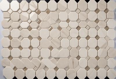 The primary subject of the image is a white tile wall with a pattern of white and grey tiles. The setting is a room with a white tile floor. The visual style is a close-up of the tile wall, showcasing the intricate pattern of the tiles. The colors and mood of the image are predominantly white and grey, giving it a clean and minimalist appearance.