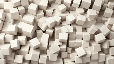 The primary subject of the image is a large pile of white blocks, which are arranged in a dense and tightly packed manner. The setting is a white background, which provides a clean and uncluttered environment for the blocks. The visual style of the image is a close-up of the blocks, showcasing their intricate details and textures. The colors and mood of the image are predominantly white, giving it a clean, minimalist, and serene appearance.