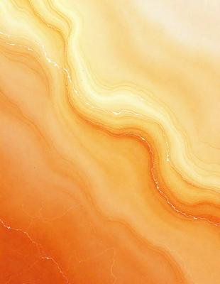 The primary subject of the image is a marbled stone surface with a yellowish hue. The setting is a natural environment, possibly a beach or a rock formation. The visual style is a close-up of the marbled surface, showcasing its unique texture and color. The colors and mood of the image are warm and earthy, with a sense of natural beauty and serenity.