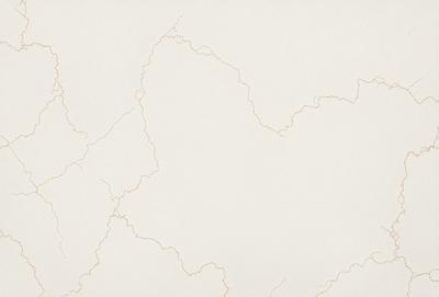 The primary subject of the image is a white wall with a pattern of lines and curves. The setting is a room with a white background, and the visual style appears to be a combination of a photo and a drawing. The dominant colors are white and beige, creating a clean and minimalist atmosphere.