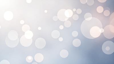 The primary subject of the image is a cloudy sky filled with numerous white bubbles. The setting is a cloudy day, and the visual style is a photo. The colors and mood of the image are predominantly white, giving it a calm and serene atmosphere.