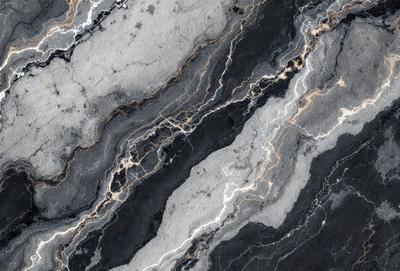 The primary subject of the image is a marble countertop with a black and white pattern. The setting is a kitchen, and the visual style is a photo. The dominant colors are black and white, creating a classic and elegant atmosphere.