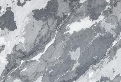 The image features a marble wall with a pattern of white and gray. The wall appears to be textured and has a unique design. The primary subject of the image is the marble wall, which serves as the main focus of the scene. The setting is indoors, likely in a building or a room with a distinctive architectural feature. The visual style of the image is a combination of photo and digital art, creating a realistic yet artistic representation of the marble wall. The colors and mood of the image are