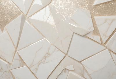 The primary subject of the image is a marble tile with a gold pattern. The setting is a bathroom, and the visual style is a photo. The dominant colors are gold and white, creating a luxurious and elegant atmosphere.