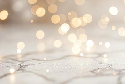 The primary subject of the image is a close-up of a sparkling surface, possibly a piece of fabric or a wall, with a pattern of glittering lights. The setting appears to be a white background, which contrasts with the sparkling surface. The visual style of the image is a combination of a photo and digital art, creating a unique and eye-catching effect. The colors and mood of the image are predominantly white and sparkling, giving it a clean and luminous appearance.