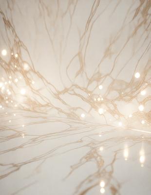 The primary subject of the image is a marble countertop with a gold-like pattern. The setting is a room with a white background, and the visual style appears to be a photo. The countertop has a gold-like pattern, and the colors and mood of the image are warm and elegant.