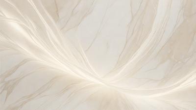 The primary subject of the image is a white marble wall with a pattern of swirls and curves. The setting is a room with a white marble floor, which complements the wall. The visual style is a close-up of the marble wall, showcasing its intricate design. The colors and mood of the image are predominantly white, giving it a clean and elegant appearance.