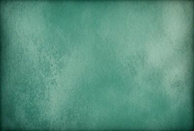 The primary subject of the image is a green wall with a mottled texture. The setting is a room with a green wall, and the visual style is a close-up of the wall. The colors and mood of the image are predominantly green, creating a calm and soothing atmosphere.