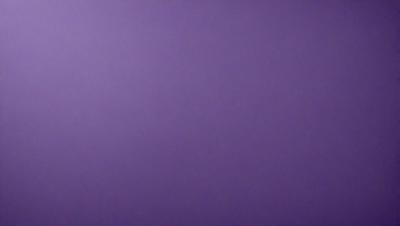 Purple wall with no visible objects.