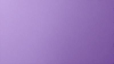 The primary subject of the image is a purple wall. The setting is a room with a purple wall, and the visual style is a close-up of the wall. The colors and mood of the image are predominantly purple, creating a calm and serene atmosphere.