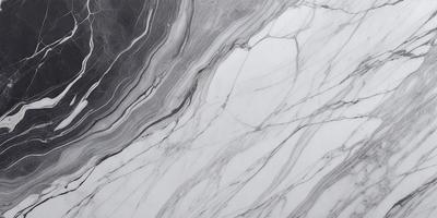 The primary subject of the image is a marble countertop with a patterned design. The setting is a kitchen or bathroom, as the countertop is a part of the counter. The visual style is a close-up of the marble countertop, showcasing its intricate pattern. The colors and mood of the image are predominantly gray, giving it a sophisticated and elegant appearance.
