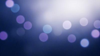The primary subject of the image is a bright, shining light source, possibly a sun or a light bulb. The light source is surrounded by a blue background, which adds to the overall atmosphere of the image. The visual style of the image is a combination of a photo and a digital art, as it captures the light source in a unique and artistic manner. The colors and mood of the image are predominantly blue, creating a serene and calming atmosphere.